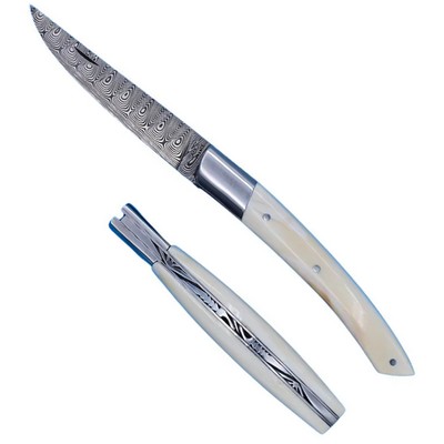Couteau le thiers damas , défense de phacochère